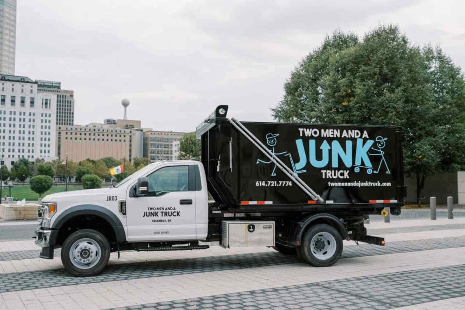 two men and a junk truck